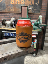 Load image into Gallery viewer, Puddin&#39;s &quot;Leatherette” Logo Koozies!
